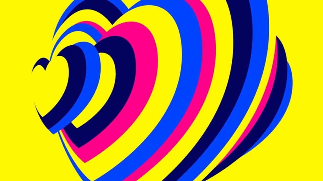 A heart-shaped multicolour stripe design against a yellow background. 