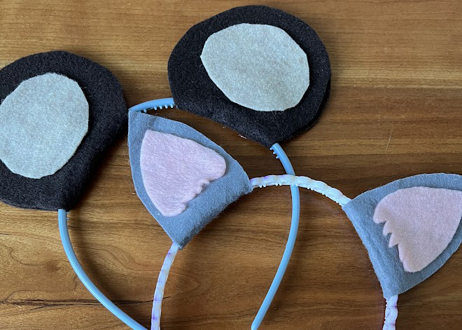 A pair of handmade animal ears Halloween headbands made from plastic hairbands and felt. 