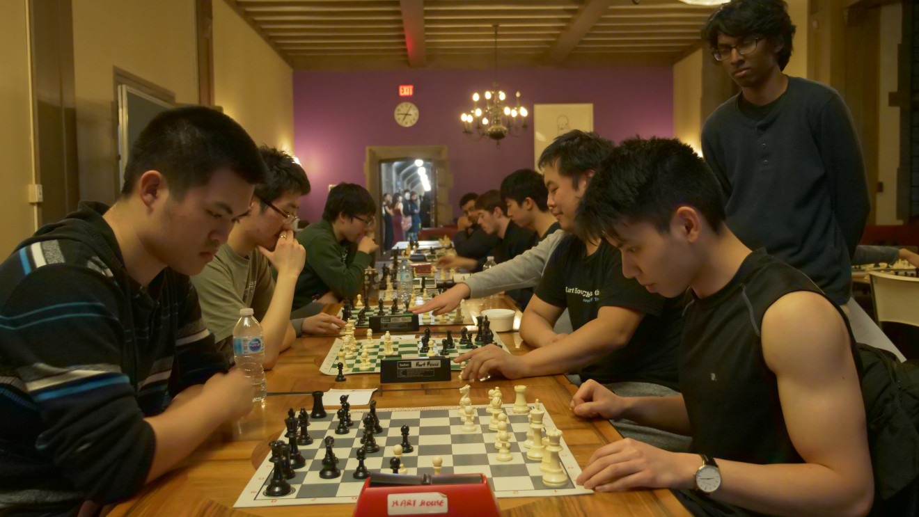 Image of chess players playing Blitz chess during the Hart House Chess Club 2019 Fischer Random Blitz Championship.