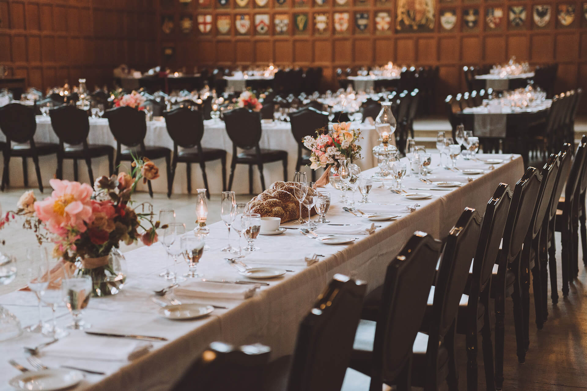 Great Hall tables, arranged for a formal dinner with flowers